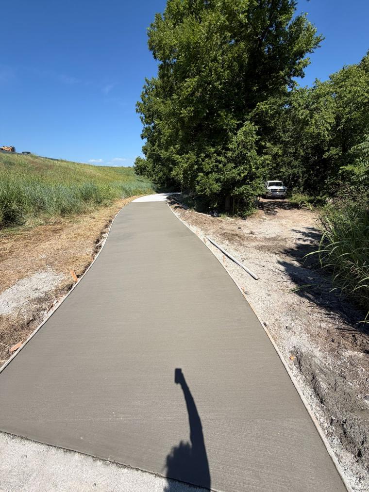 Trail Work & Memorial Pad — Park Development concrete project by Kansas Construction Services