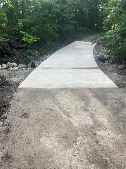 Trail Work & Memorial Pad photo 8 of 11 - Park Development concrete work by Kansas Construction Services